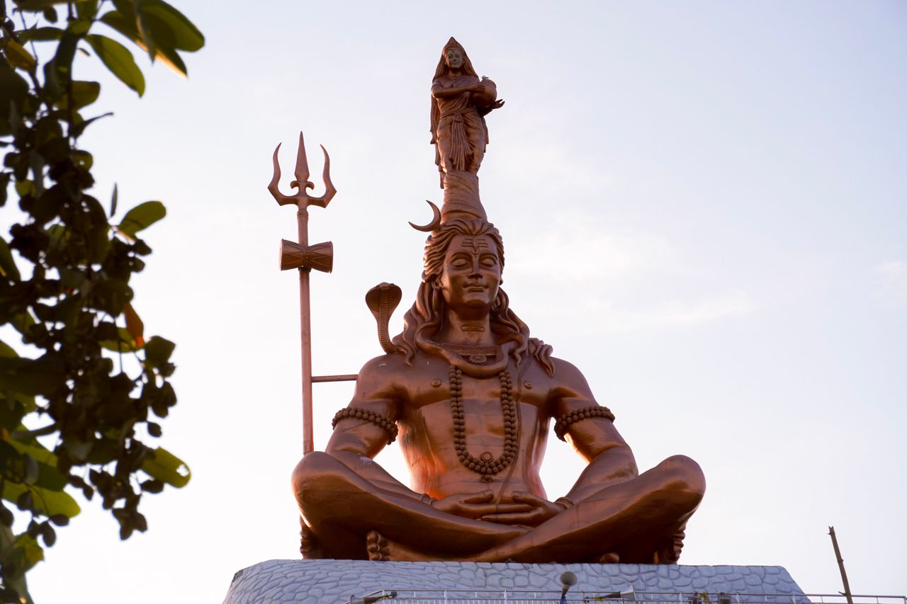 A striking statue of Lord Shiva under the open sky in Hajipur, India.